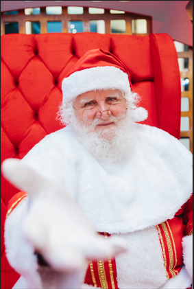 Papai Noel chega ao Uberlândia Shopping em grande estilo com caravana iluminada da Coca-Cola