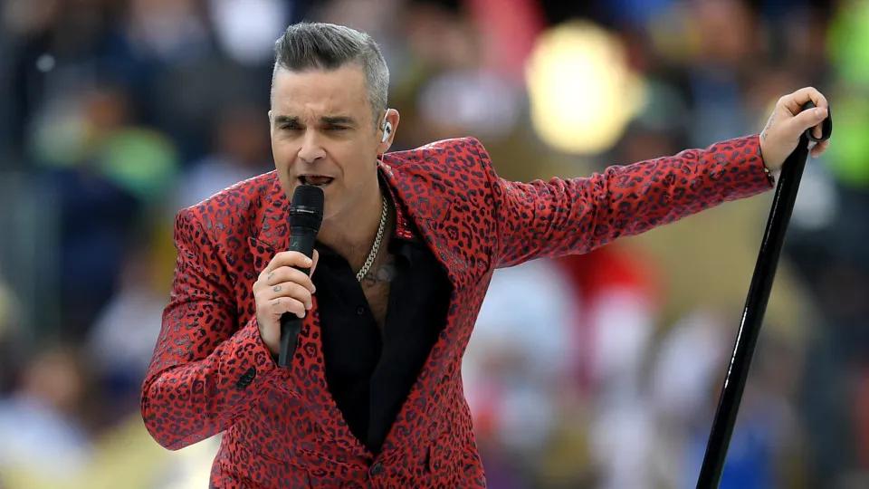 Robbie Williams retorna ao Brasil e quer mostrar que é o 'mestre do entretenimento' 