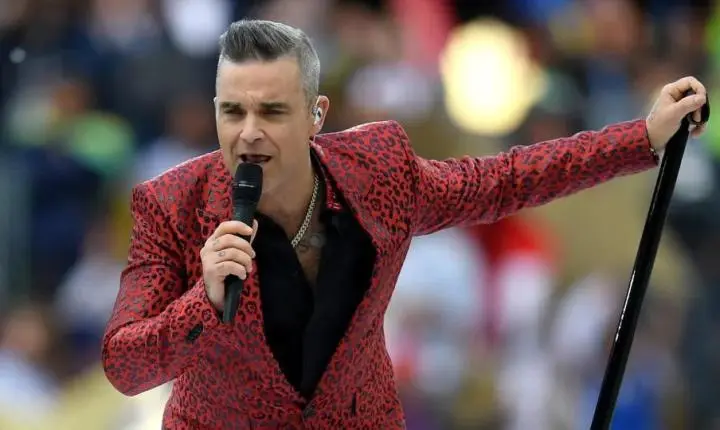 Robbie Williams retorna ao Brasil e quer mostrar que é o 'mestre do entretenimento' 